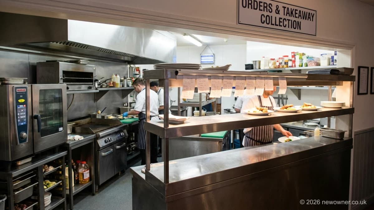 Restaurant for sale UK: commercial kitchen pass and lit takeaway counter